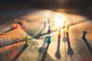 thumbtacks on a map